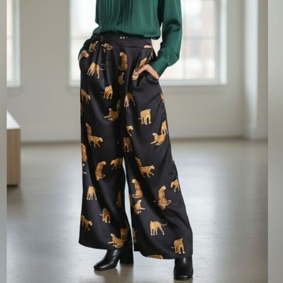 Stylish black wide-leg pants. Features a bold leopard print. - Picture 1 of 15